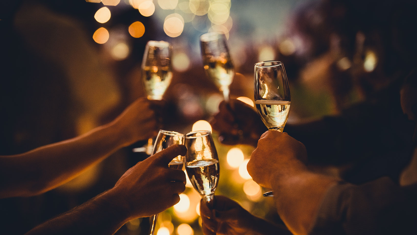 Champagne cheers at a wedding, evening